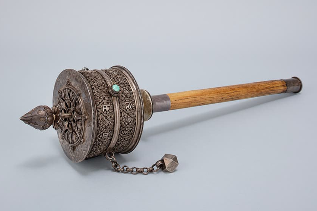 a handheld prayer wheel