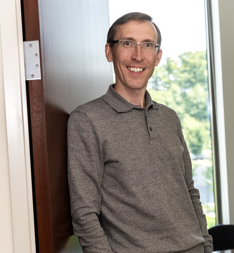Michal Grubb, Assoc. Prof. (Economics) photographed in his office for a future issue of Chronicle.