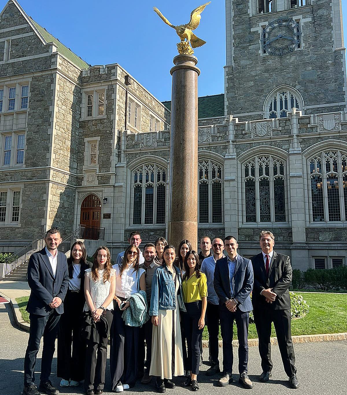 A group of the visitors on campus