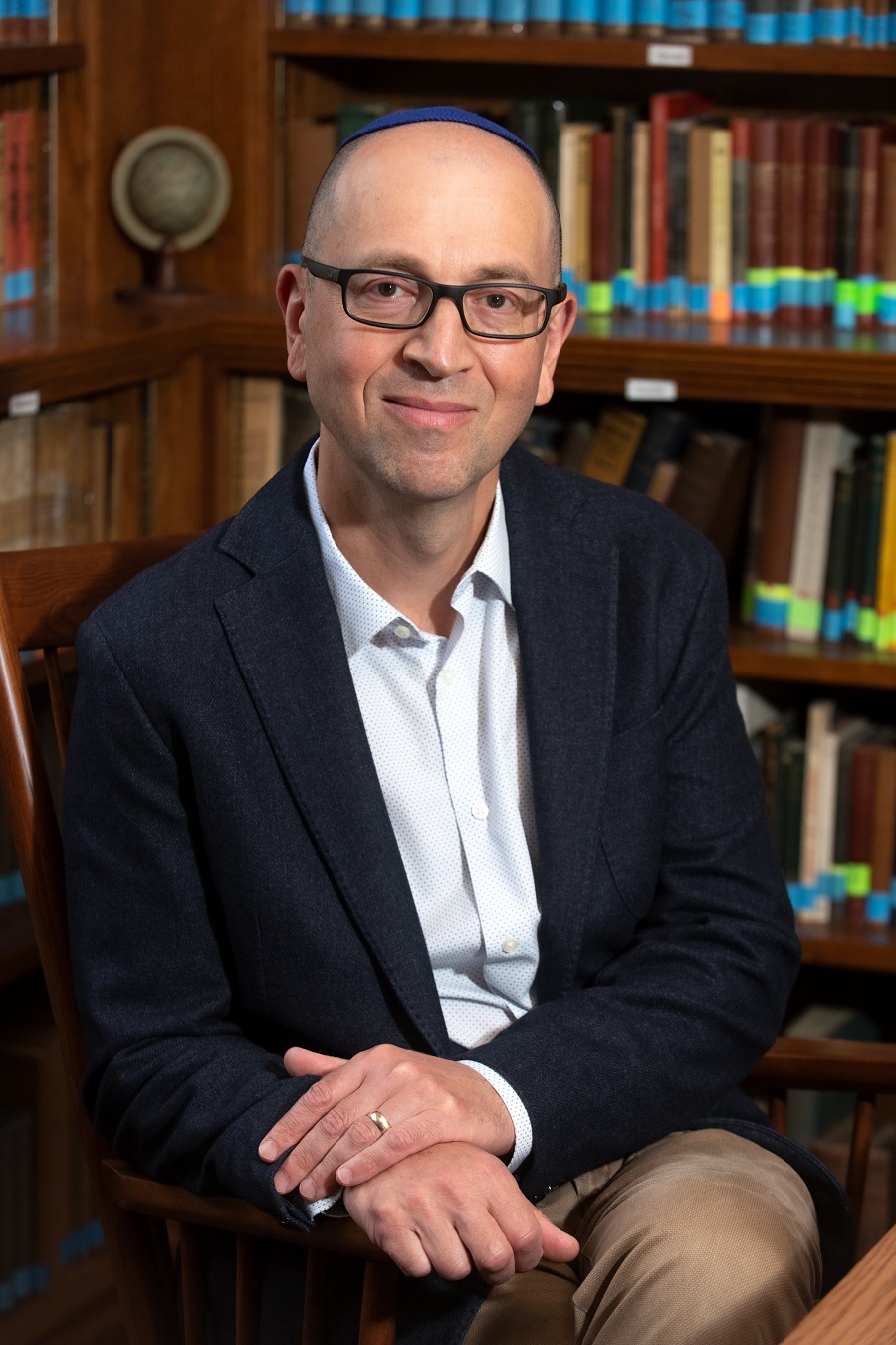 Updated portrait of Prof. Maxim Shrayer in the Dept. of Eastern, Slavic & German Studies photographed in the library of the department.