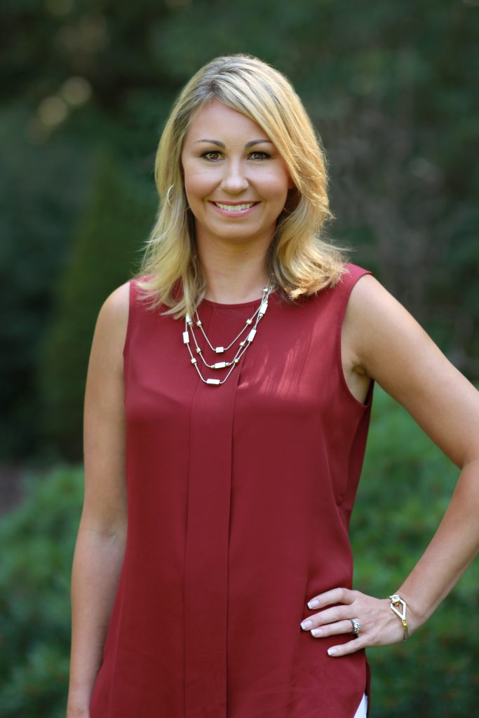 Jenna Grodzicki in a red dress