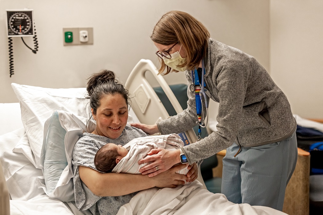 January 27, 2025 -- Boston College Connell School of Nursing​ participati​ng in the midwifery program at Mount Auburn Hospital in Cambridge, Massachusetts, with Katie (Katharine) Hutchinson, Associate Professor of the Practice, Connell School of Nursing​ (black blazer)​, and Julia Dickinson, Director of Midwifery Services, Midwives at Mount Auburn Hospital (scrubs).