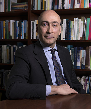 Andrea Vicini, the Rev. Michael P. Walsh Chair in Bioethics (Theology) photographed in his office for the Fall '19 issue of BCM.